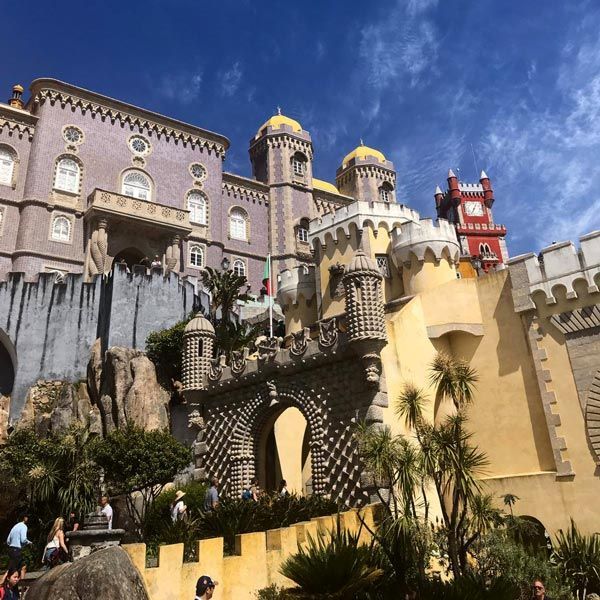 Morrocaan inspired building building with elaborately decorated turrets and gardens
